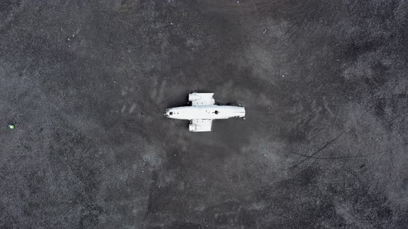 Aerial of an Abandoned Crashed Plane Wreckage on Solheimasandur Beach Iceland