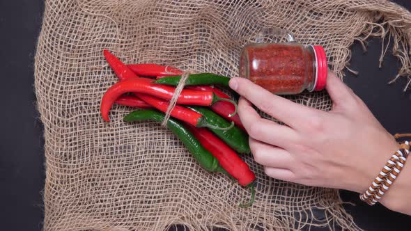 Red and Green Hot Chili Pepper Top View with Spices. Flat Lay