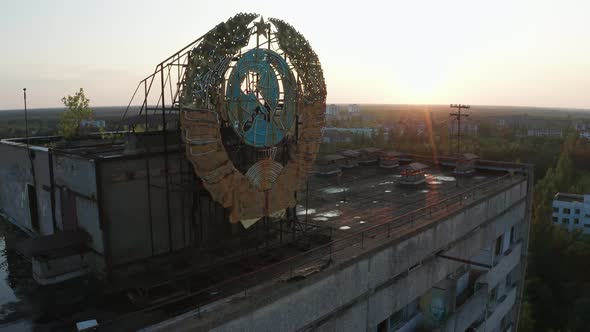 Drone Shot of Emblem on Building's Roof in Pripyat