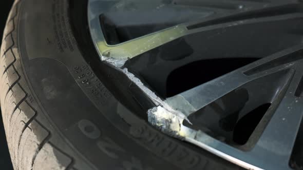 Close Up View of Broken Rim As Result of Traffic Accident