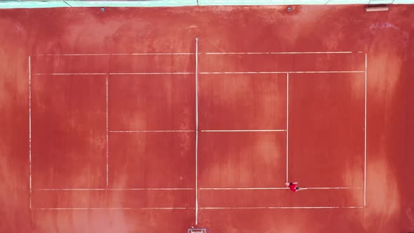 View From Above of a Tennis Court Getting Marked