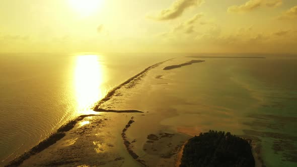 Aerial flying over panorama of tropical seashore beach break by blue sea with white sand background 