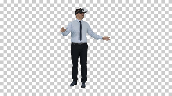 Astonished young businessman wearing VR glasses Concept of the