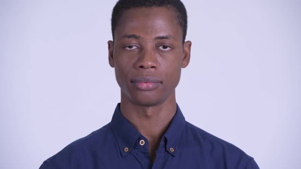 Face of Young Handsome African Businessman