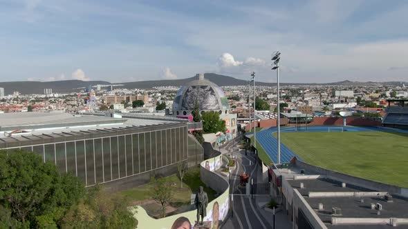 Aerial View Of Centro Cultural Gomez Morin, Monument to Columbus And New Olympic Stadium of Queretar
