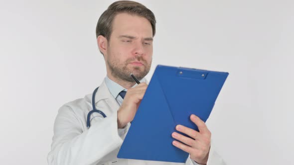 Businessman Reading Documents on White Background