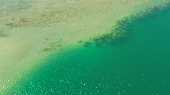 Tropical Landscape with Blue Sea and Coral Reef