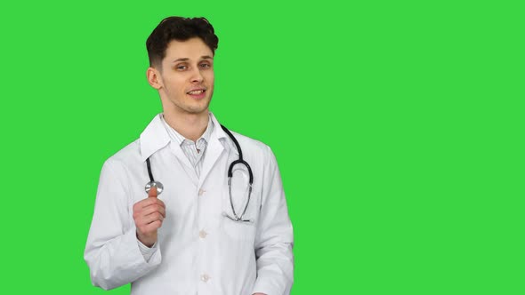 Orthopedist Talking To Camera and Dancing After Everything Will Be Fine on a Green Screen, Chroma