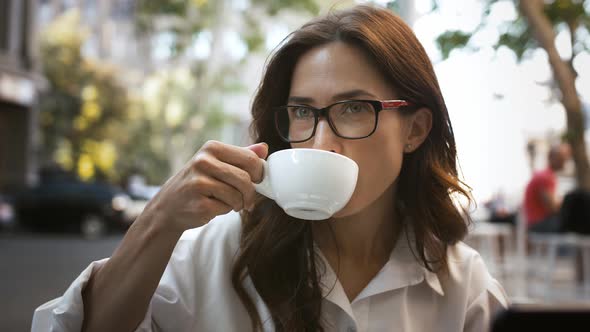 Girl in Glasses and White Shirt