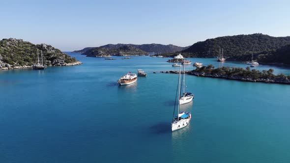 Aerial View of Sailing Yachts and Cruise Boats in the Turquoise Waters of the Bay and a Series of