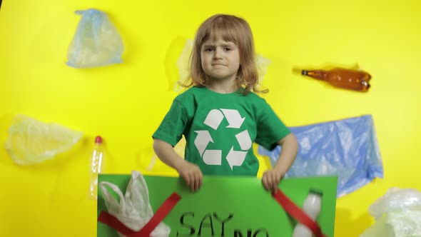 Girl Activist Holding Green Poster Say No To Plastic. Plastic Nature Pollution