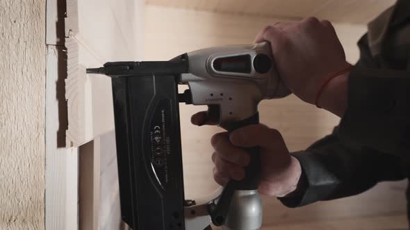 Pneumatic Nail Gun is Used in Construction