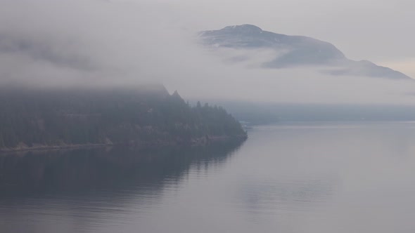 Canadian Nature View on the Pacific West Coast During Cloudy and Foggy Winter Day