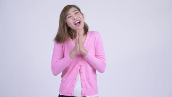 Young Happy Asian Woman Clapping Hands