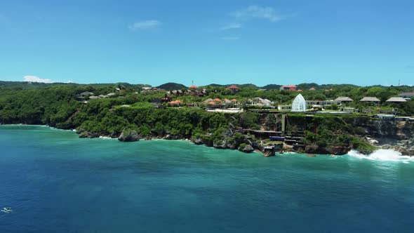 Fly to Uluwatu cliff with ocean and sky on Bali