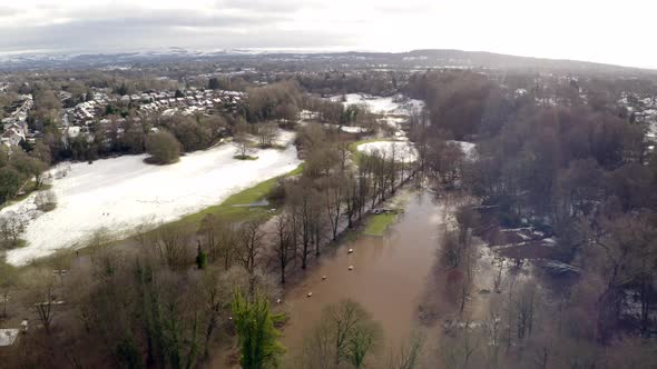 Aerial footage from Drone showing the river Bollin in Wilmslow, Cheshire after heavy rain and with b