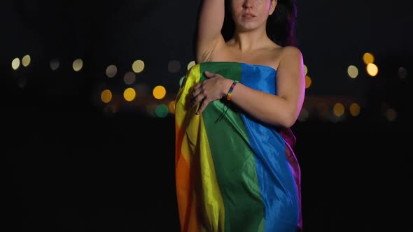 Beautiful Naked Lesbian Woman Covers Body with Rainbow LGBT Flag