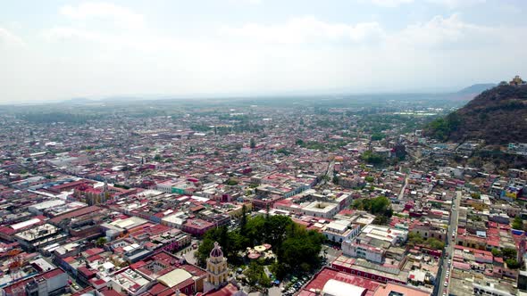 Drone shot of Atlixco Mexico main plaza and sourroundings