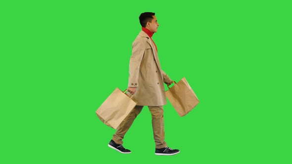 Hispanic Man Walking From Grocery Store on a Green Screen Chroma Key