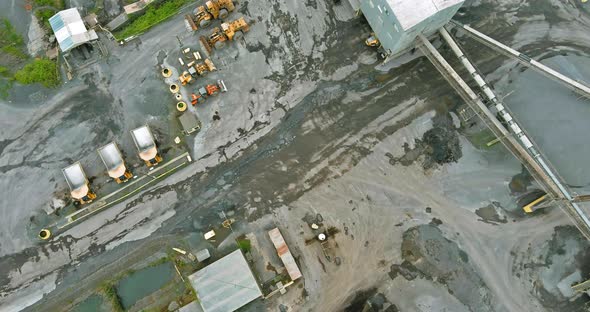 Panorama aerial view open pit mine mining, dumpers