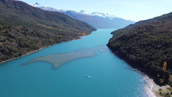 Top aerial drone panoramic view Beautiful snowy mountains landscape and a impressive turquoise crist