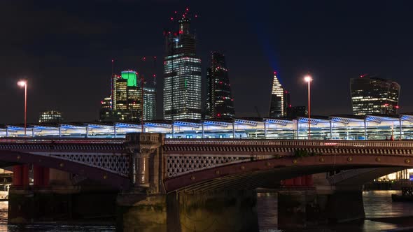 Blackfriars Bridge and the Skyscrapers of the City of London at night, London, United Kingdom