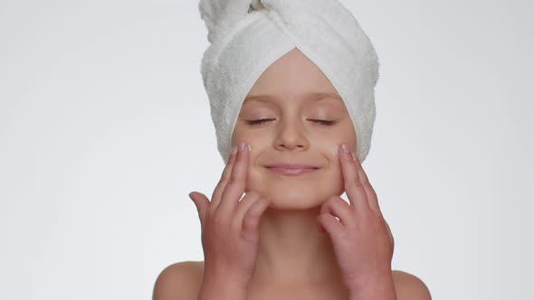 Pretty Young Child Girl Applying Cleansing Moisturizing Face Cream Skincare Natural Creme Cosmetics