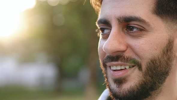 Face Attractive Brunette Bearded Handsome Man at Sunset Smiling Beautiful Around Brown Eyes