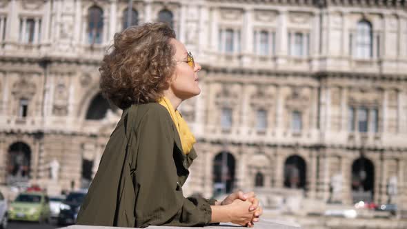 Woman Tourist Enjoying City Sightseeing. Travel To Europe Concept