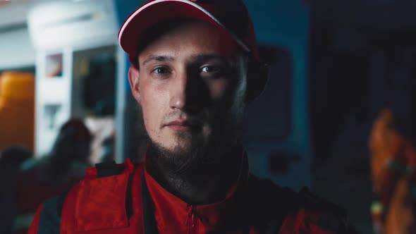 Bearded Paramedic Working at Night