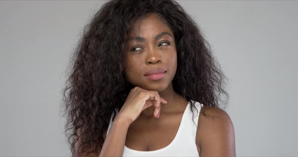 Thoughtful Ethnic Female Looking Away