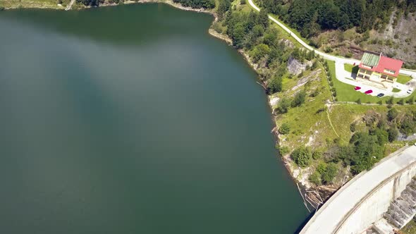 Tilting Aerial Drone Shot that Reveals a Seaside Mountain Village.