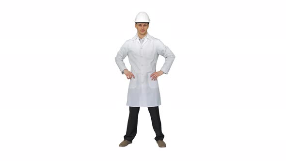 A Young Engineer Putting Safety Hat on on White Background