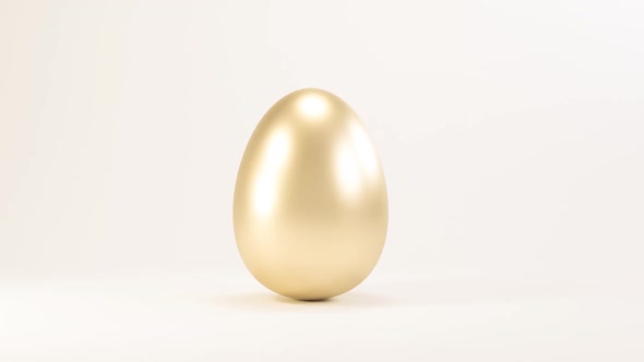 Easter Golden Glitter Egg Swings From Side to Side on White Background