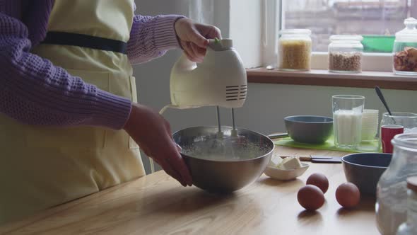 Woman Is Cooking Sweets at Home