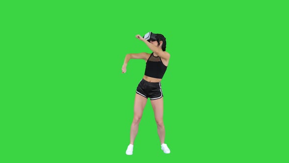 Girl Playing Virtual Reality Dancing Game Experienced Dancer on a Green Screen, Chroma Key