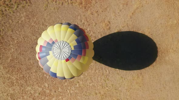 Still Aerial  Top Down of Landed Vibrant Colorful Hot Air Balloon California