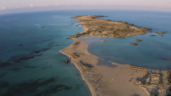 Flying above beach in the Morning. Flyover island in Mediterranean Sea