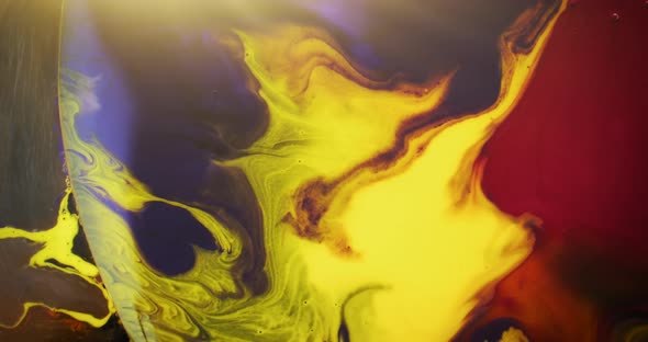 Abstract colors dissolving in water creating psychedelic effect. Liquid color macro concept. 