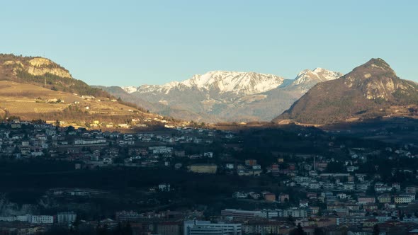 Shadow Covers Town Trento Against Giant Forestry Mountains