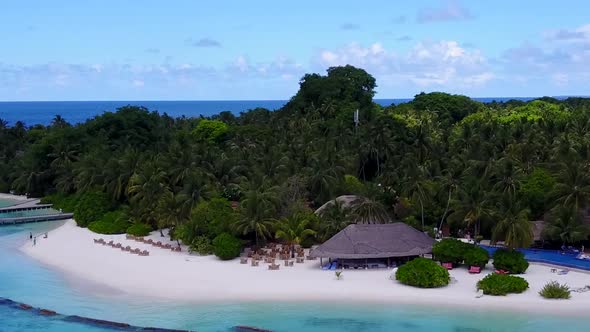 Drone scenery of coast beach break by blue sea with sand background