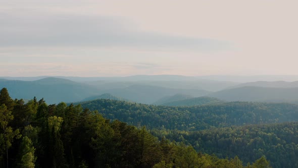 Beautiful sunset on a forest plain The Krasnoyarsk Stolby