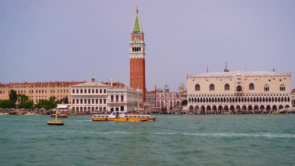 Ferry Crossing The Lido di Venezia In Front Of Saint Mark's Square In Venice, Italy - wide