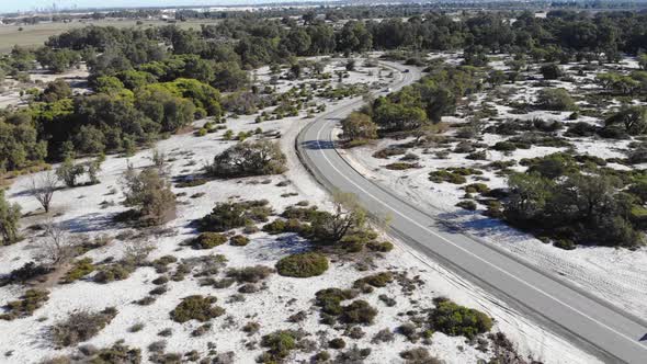 Aerial View of a Road in Small Forest in Australia