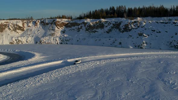 Aerial View of an Ice Rally on a Snowy Track