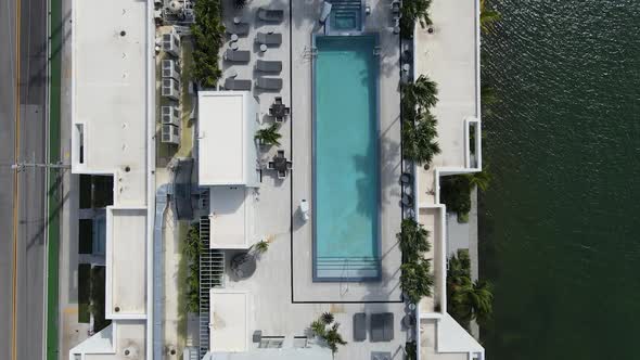 Drone Flying Over Rooftop Pool