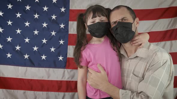 Pandemic. Coronavirus. American man with a child.