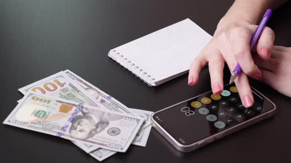 Budget Planning Using Calculator Notepad