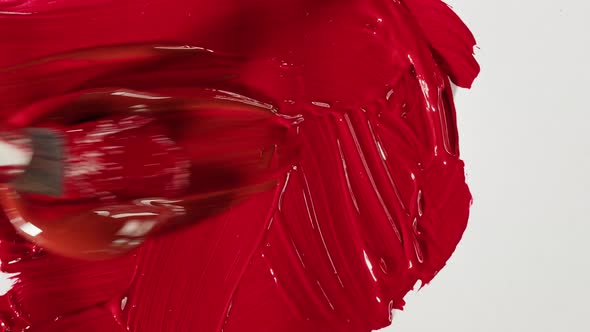 Mixing Red Paint Closeup alt