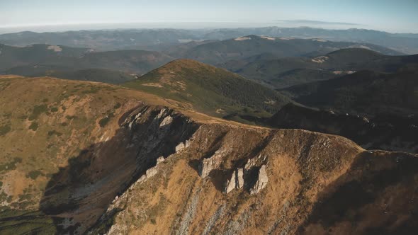 Aerial Closeup Rock Mountain Top